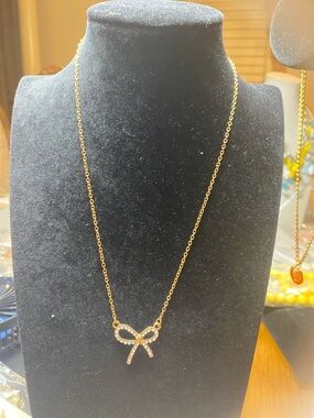 Delicate Gold Bow Pendant Necklace